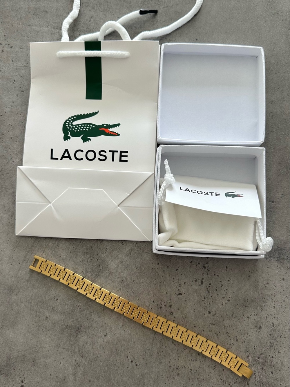 Lacoste Gold Bracelet with Branded Pouch and Box